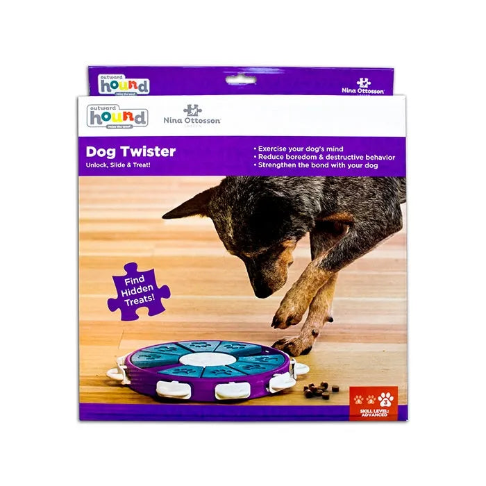 Dog Twister outward hound puzzle toy packaging with a dog interacting with it on a wooden floor.