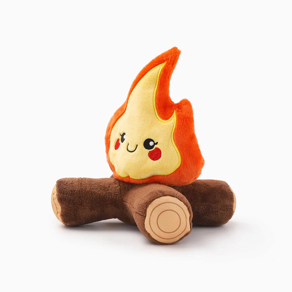 Hugsmart pet plush toy shaped like a flame on a wooden log facing sideways with a white background