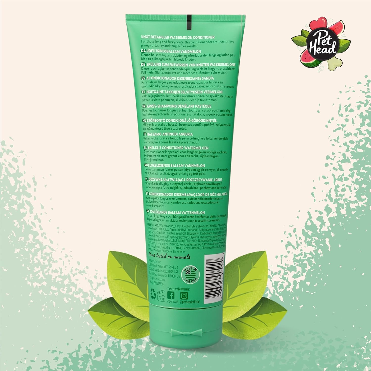 Green tube of Pet Head product with brand logo on a light green background