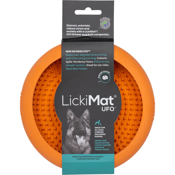 Orange LickiMat UFO dog toy with packaging on a white background
