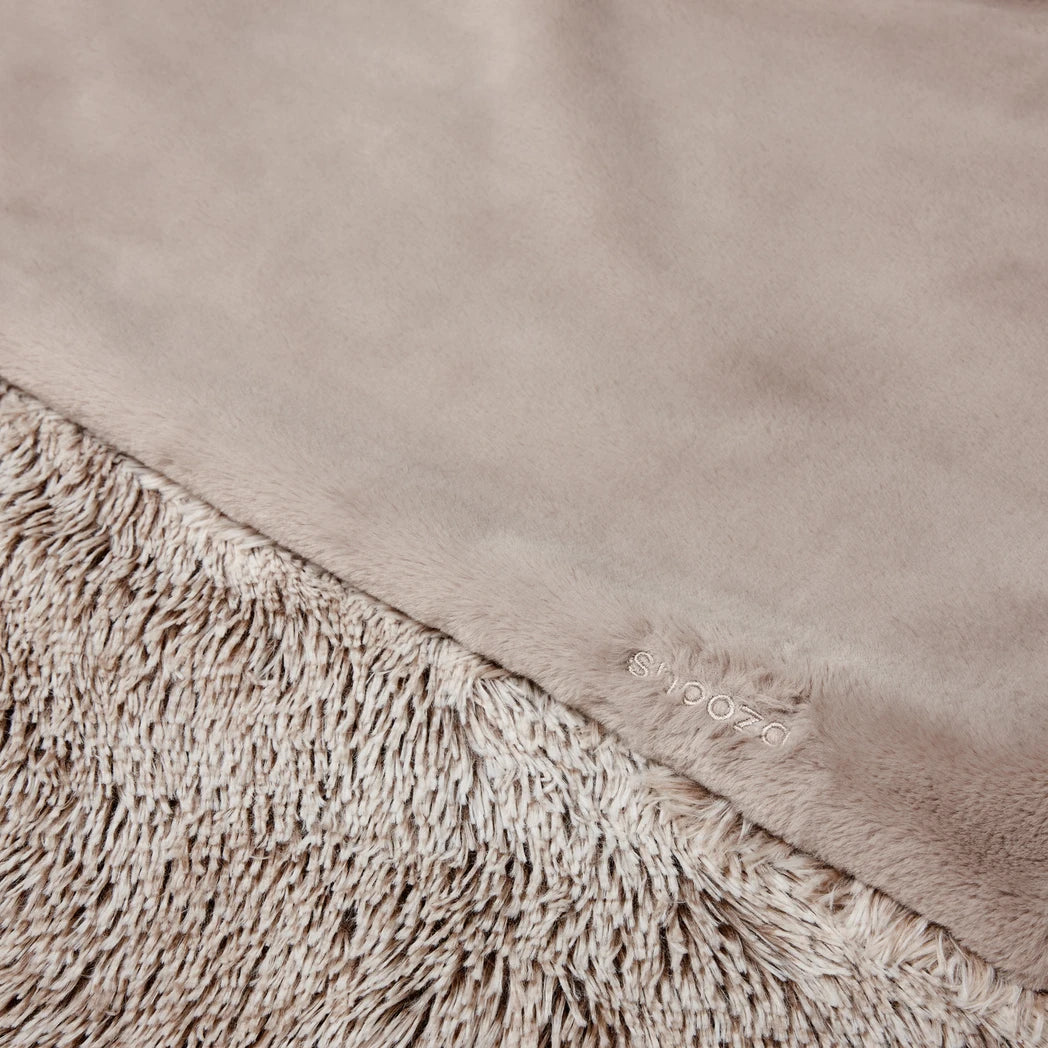 Close-up of a beige Snooza textured blanket