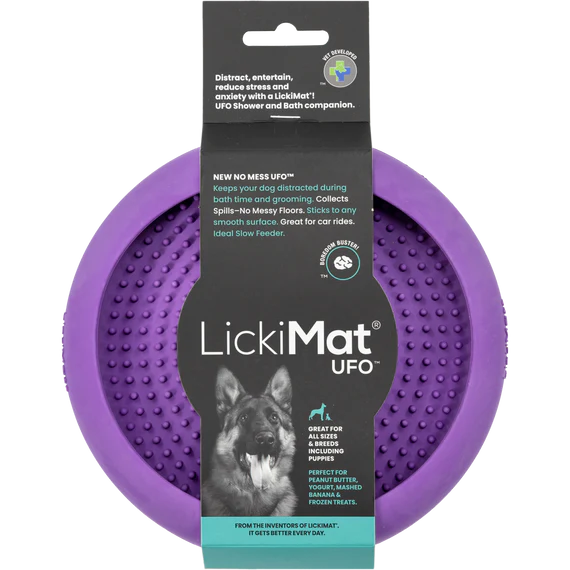Purple UFO-shaped LickiMat with packaging on a white background