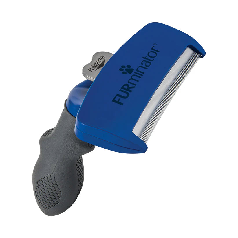 Blue and gray FURminator pet grooming tool on a white background